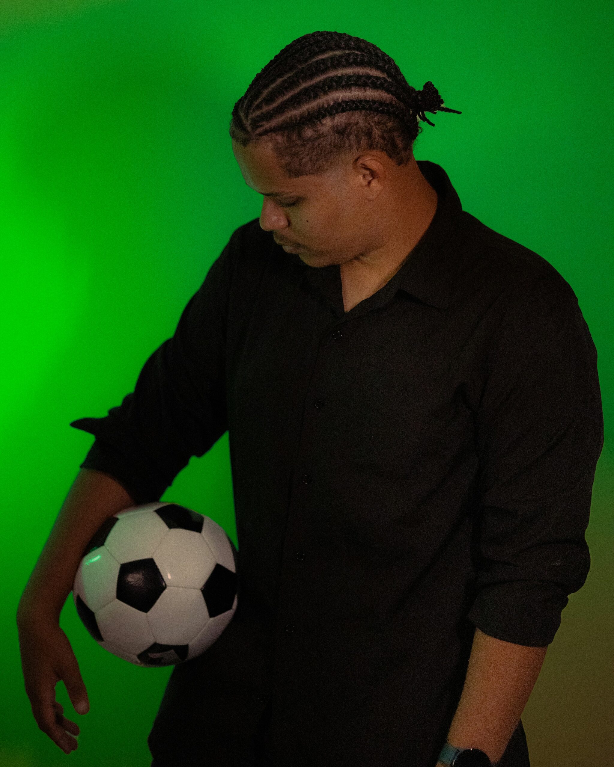 Professional football player celebrating after signing major contract in 2026 season.